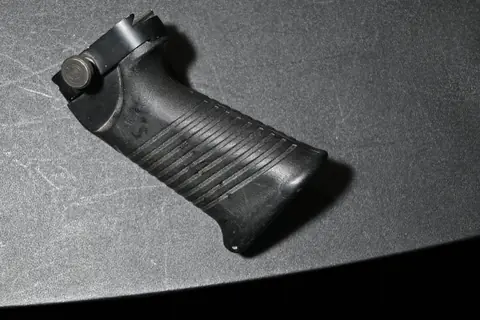 Used M249 SAW grip reference photograph